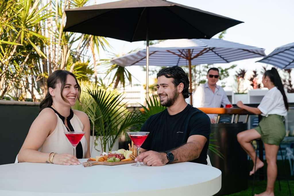 H On Mitchell Apartment Hotel Darwin Restaurant bilde